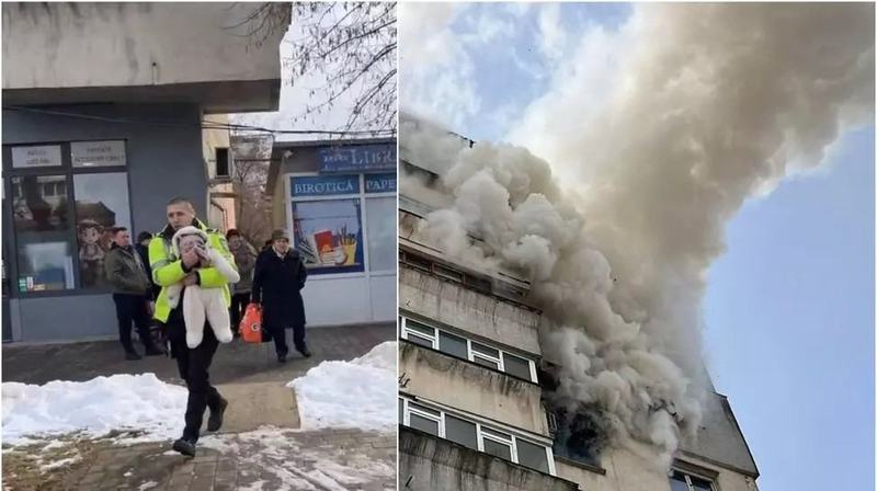 Momentul in care un politist din Iasi a salvat un bebelus dintr-un apartament cuprins de flacari