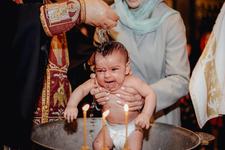 De ce este bine sa iti botezi copilul de mic