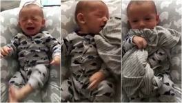 VIDEO. Un tata reuseste sa-si calmeze copilul care plange dupa ce ii da un tricou purtat de mama sa